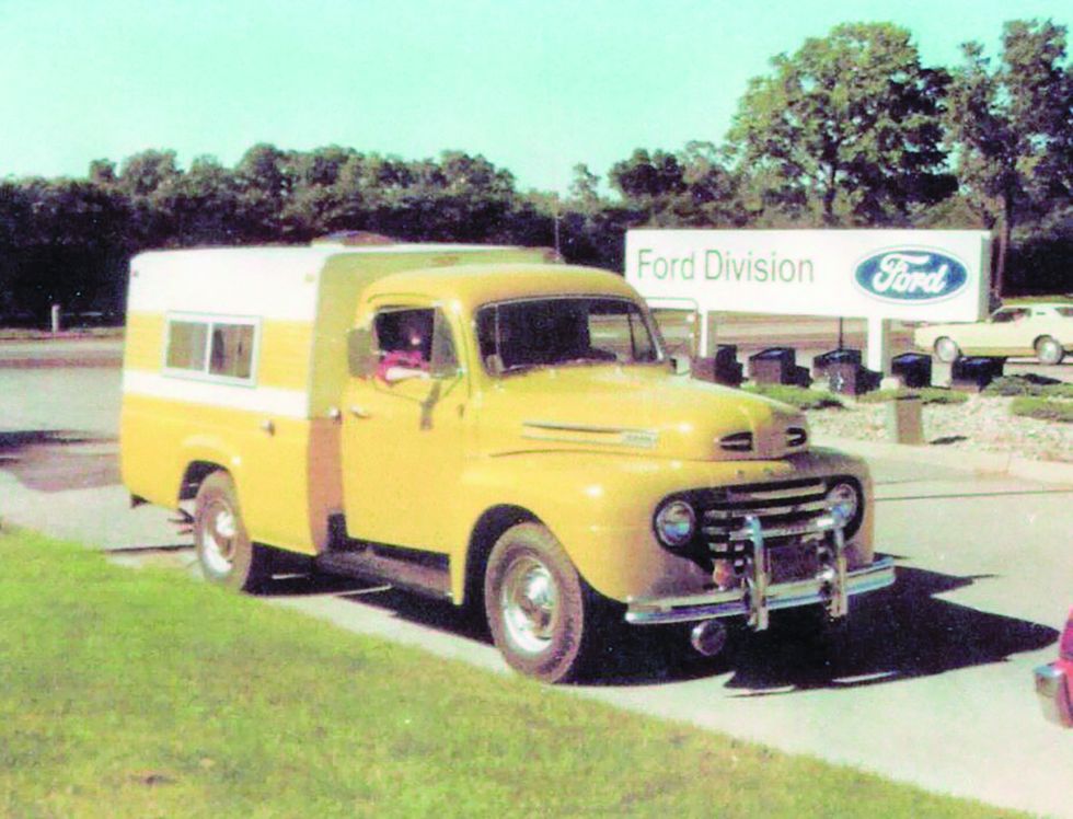Color image of a 1950 Ford F-3 truck parked in a front 3/4 position. 