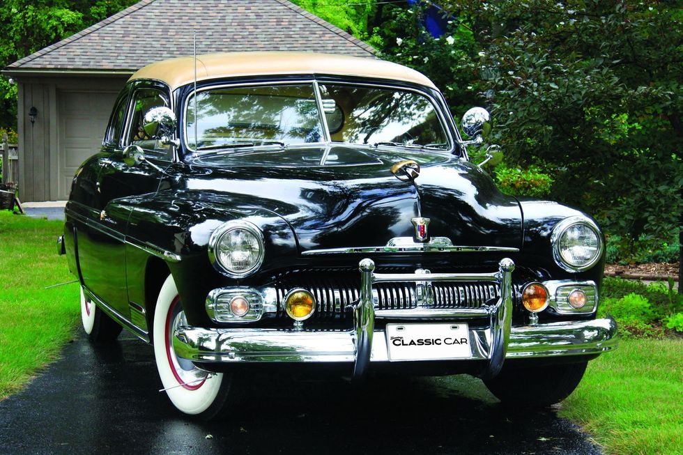 Color image of a 1950 Mercury Monterey Sport Coupe parked in a front 3/4 position.