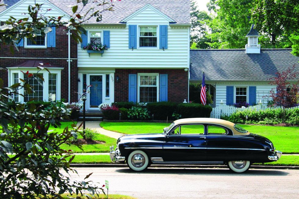 Color image of a 1950 Mercury Monterey Sport Coupe parked in a profile position.