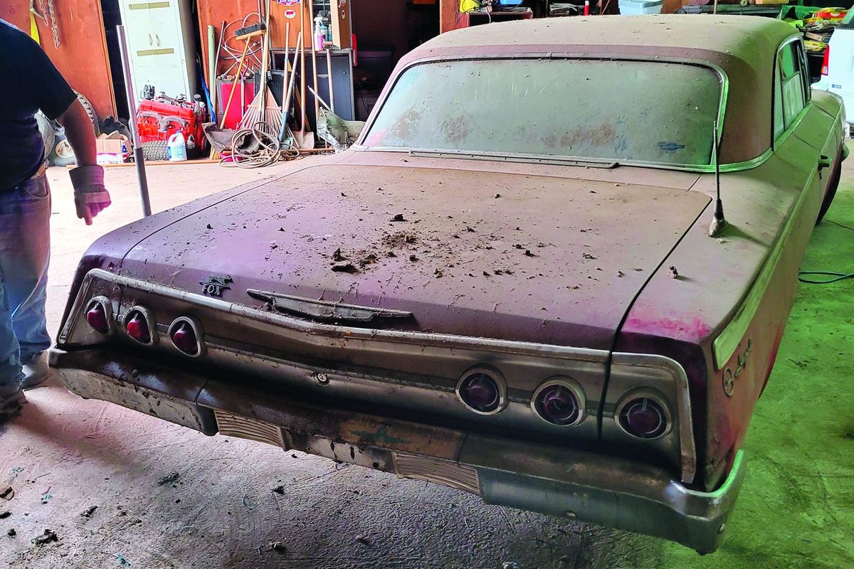 Color image of a 1962 Chevrolet Impala barn find, rear 3/4 position.