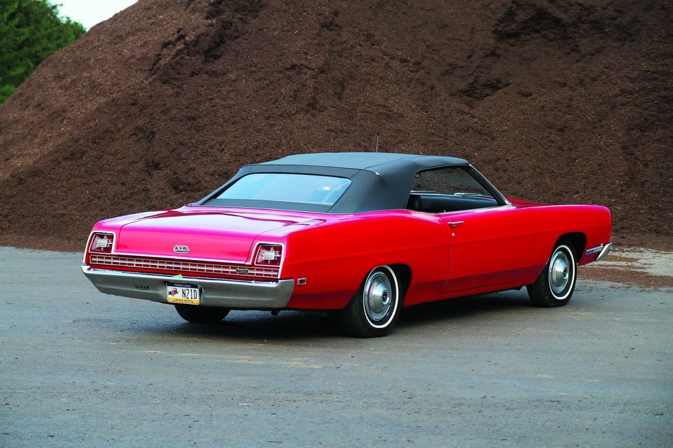 Color image of a 1969 Ford XL convertible parked in a rear 3/4 position.