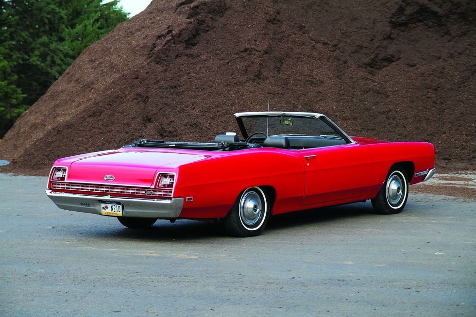 Color image of a 1969 Ford XL convertible with the top down parked in a rear 3/4 position.