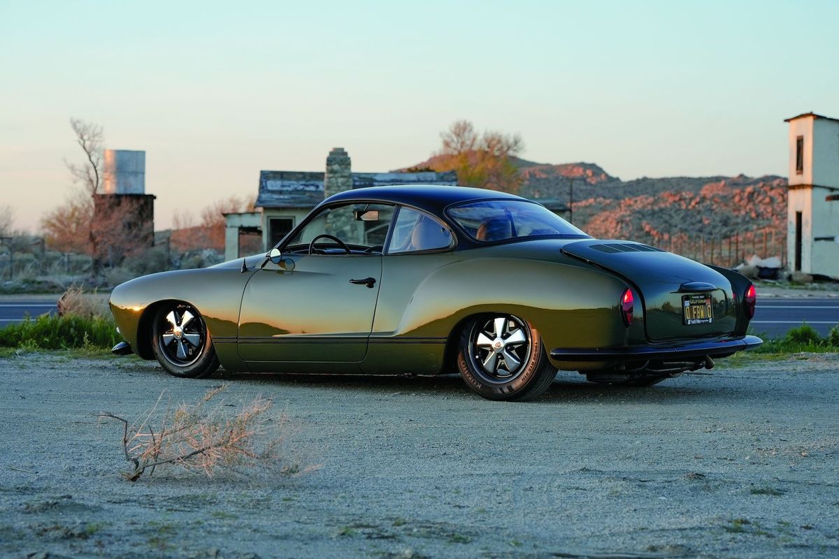 Color image of a customized 1965 Volkswagen Karmann Ghia parked in a rear 3/4 position.
