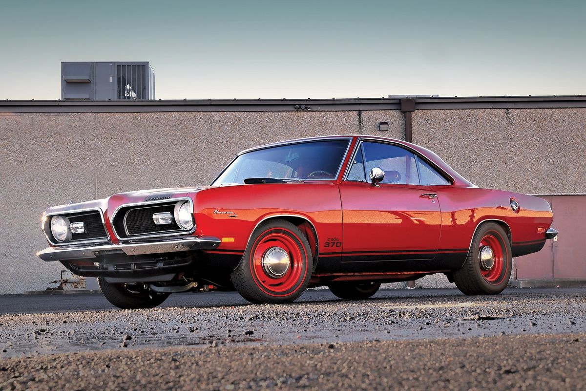 Color image of a modified 1969 Plymouth Barracuda parked in a front 3/4 position.