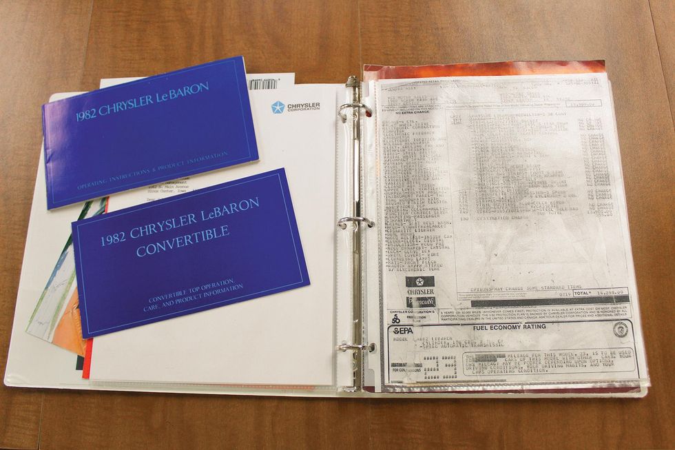 Color image of documents that came with the Chrysler LeBaron Medallion Mark Cross edition.