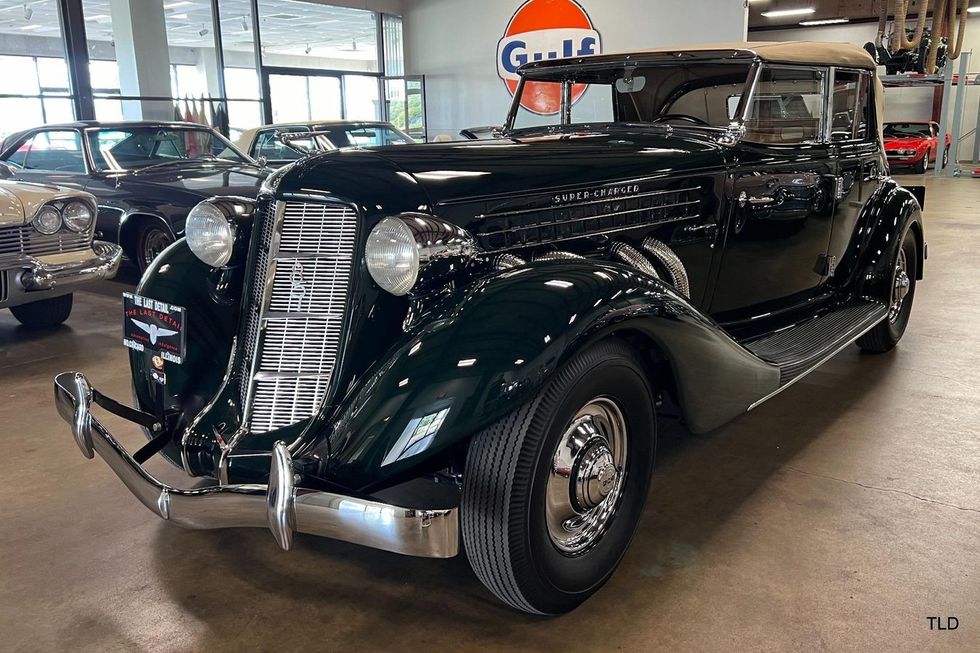 dark green 1935 Auburn 851 SC phaeton front quarter