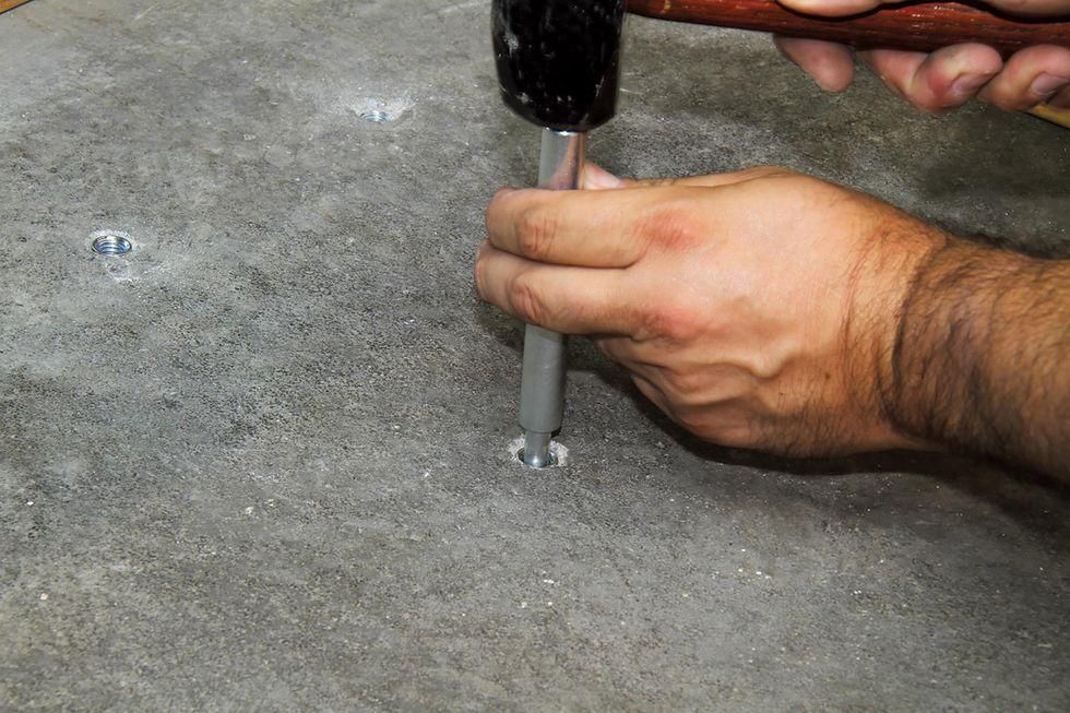 Installing an electric winch in your garage makes moving vehicles easy