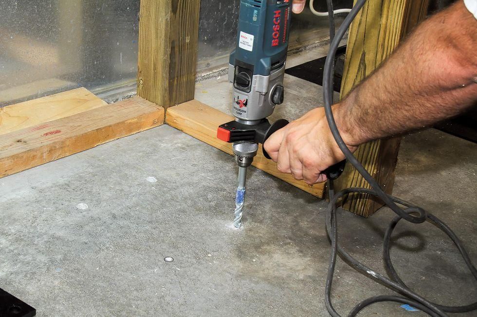 Installing an electric winch in your garage makes moving vehicles easy