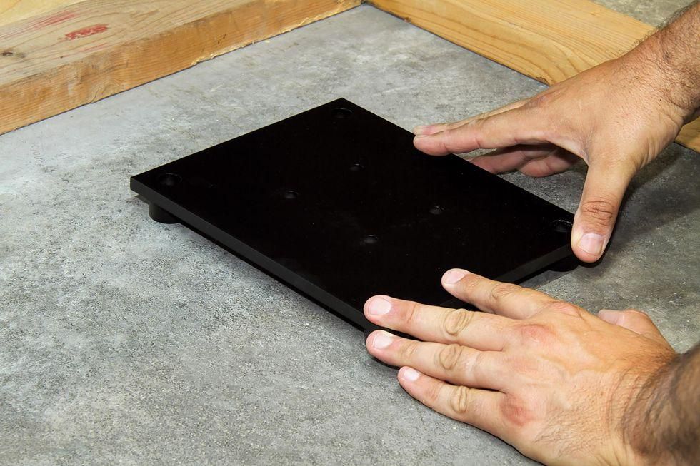 Installing an electric winch in your garage makes moving vehicles easy