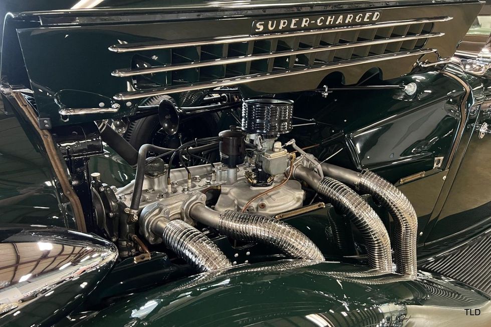 green 1935 Auburn SC phaeton supercharged Lycoming engine exhaust pipes