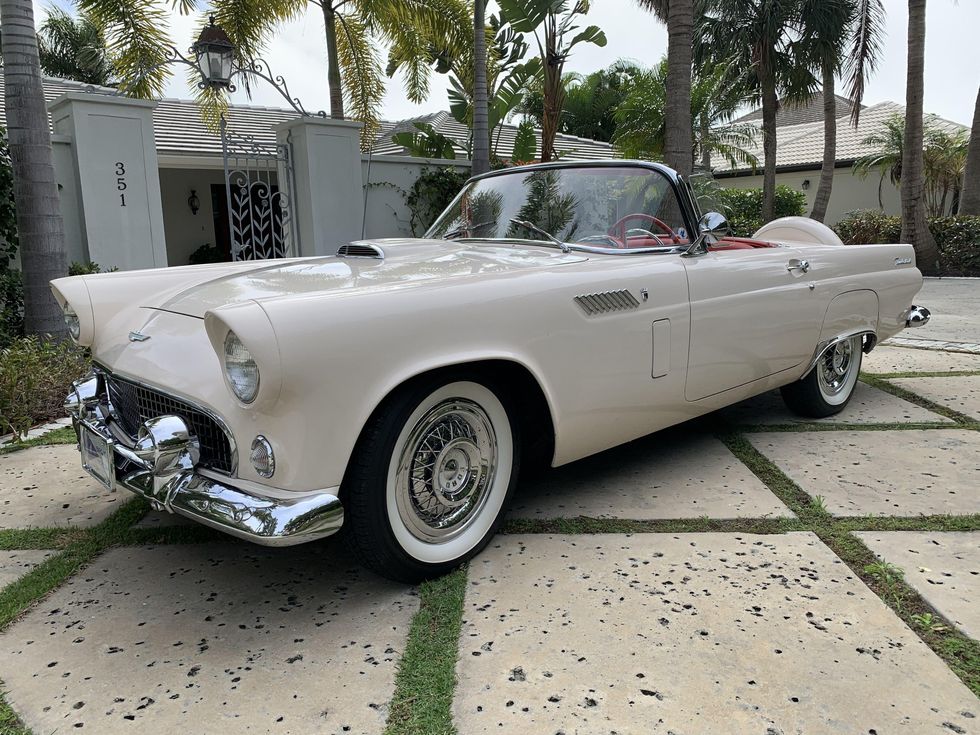 An Austin-Healey 3000, a Porsche 911, and a convertible Dodge Dakota ...