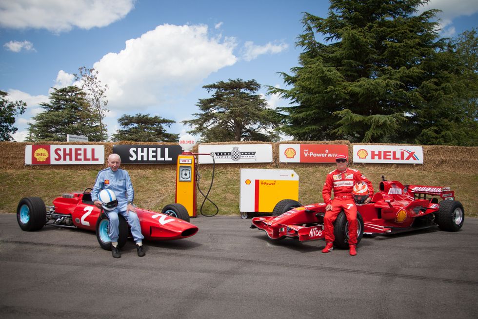 John Surtees and Kimi R\u00e4ikk\u00f6nen at the 2014 Goodwood Festival of Speed.