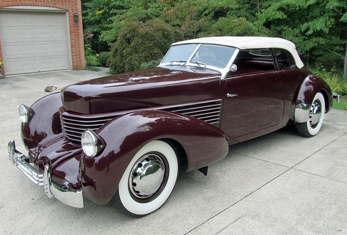 maroon 1937 Cord 812 Phaeton Convertible Sedan top up lights up