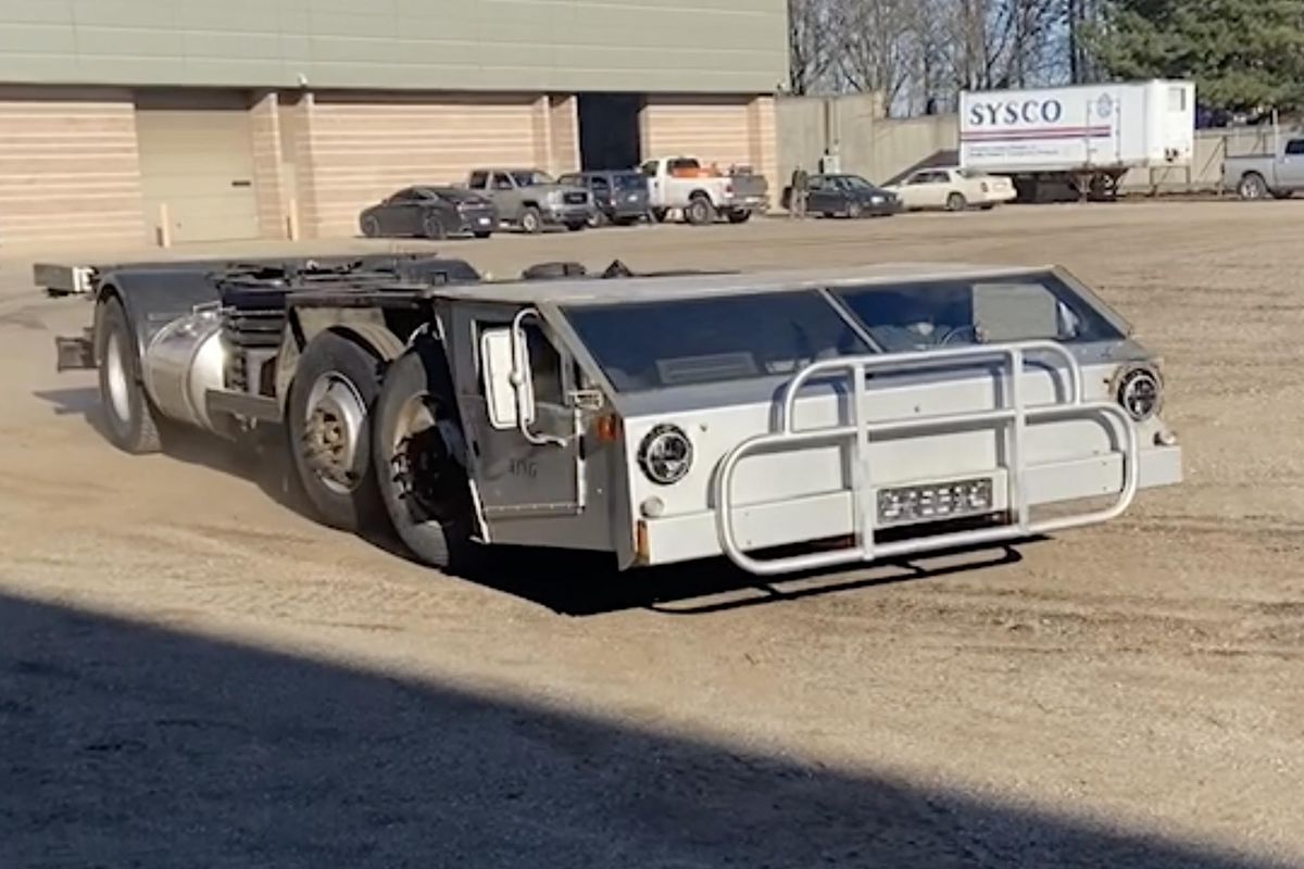Strick's unconventional Cab-Under truck prototype, designed to skirt trucking length laws, returns to the United States, restoration underway