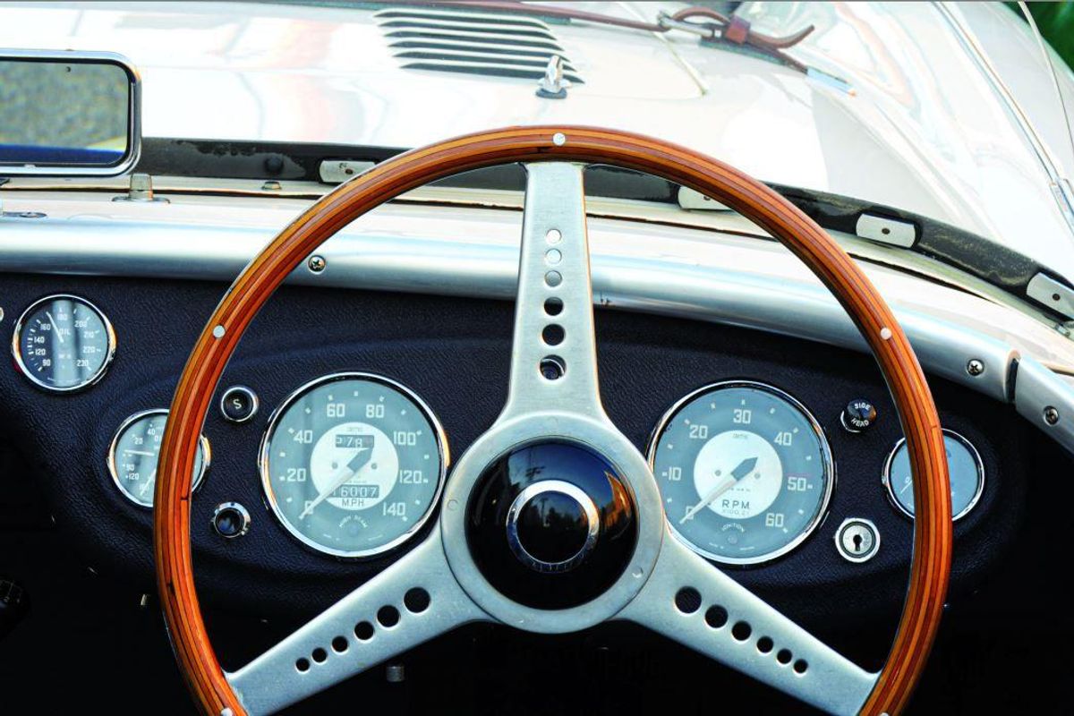 The dashboard of this Sebring-veteran 1955 Austin-Healey 100s was beautiful  business