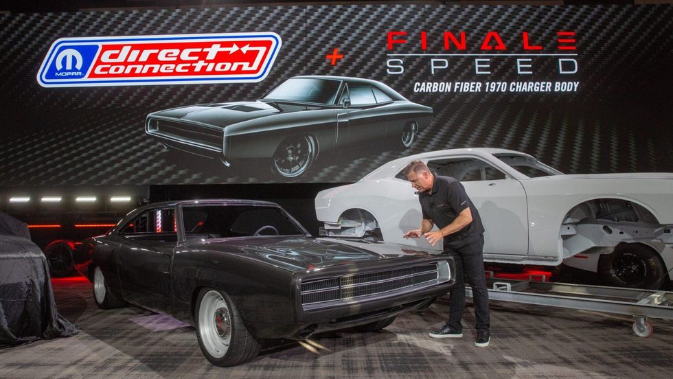 Tim Kuniskis with the Finale carbon-fiber Dodge Charger body